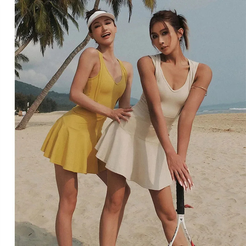 Badminton Youtube - ชุดเทนนิสหญิงแขนกุดชุดกีฬาการฝึกอบรมการวิ่งออกกำลังกายกระโปรงสั้นกอล์ฟแบดมินตันชุดวอร์มกระโปรงโยคะแบบมีฟองน้ำ NM33
